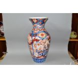 A LATE 19TH CENTURY IMARI PORCELAIN BALUSTER VASE, decorated with foliate panels, birds and bats,