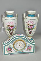A PAIR OF MINTON ROSE BASKET VASES AND A MINTON ROSE CLOCK, comprising a pair of Minton limited