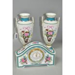 A PAIR OF MINTON ROSE BASKET VASES AND A MINTON ROSE CLOCK, comprising a pair of Minton limited