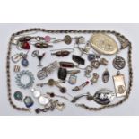 AN ASSORTMENT OF SILVER AND WHITE METAL JEWELLERY, to include seven silver novelty charms, a