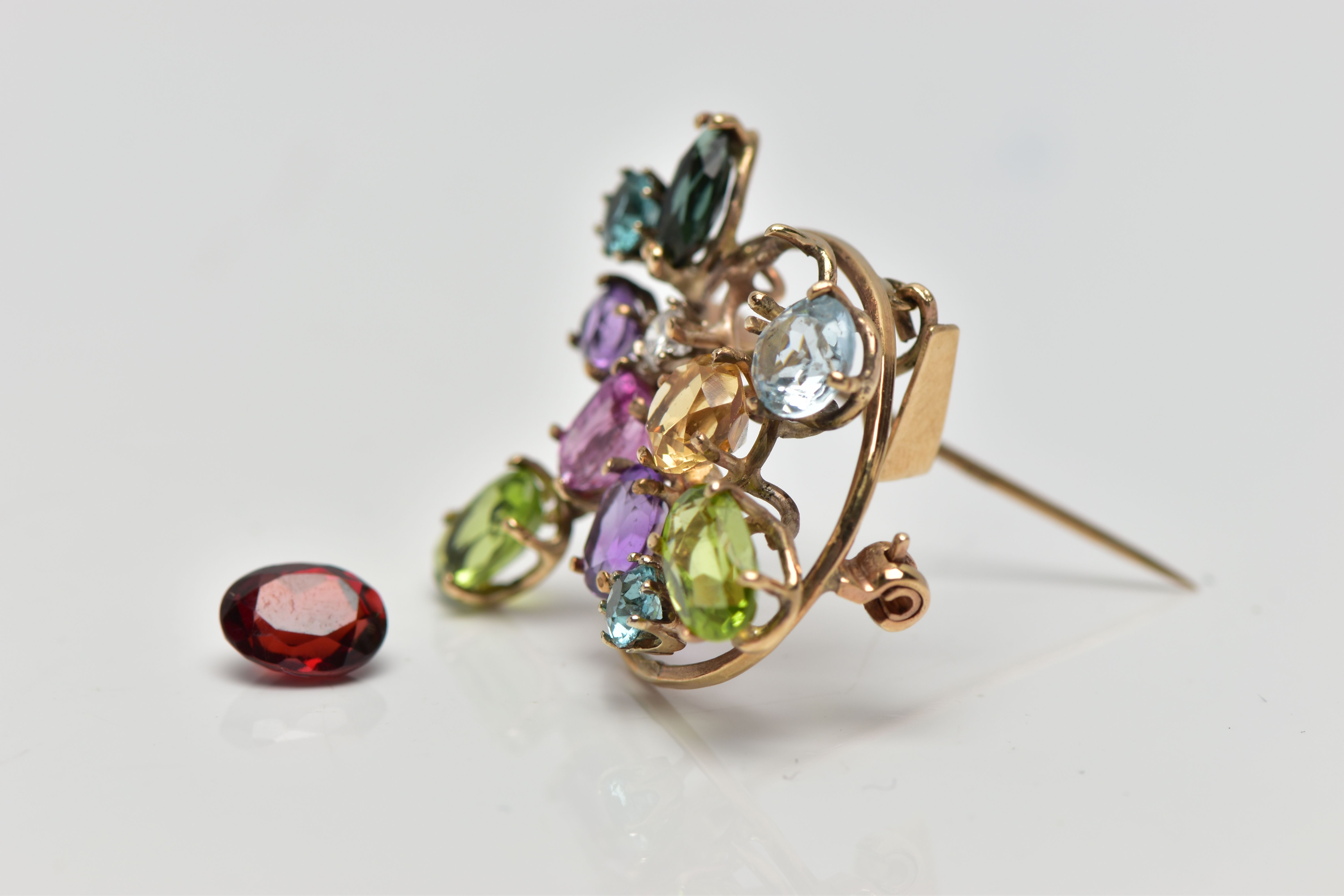 A 9CT GOLD DIAMOND AND COLOURED GEM SET BROOCH, of openwork design the circular cut diamond, - Image 3 of 4
