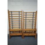 TWO PINE SINGLE BEDSTEADS, with all bolts (condition:-some paint splashes)