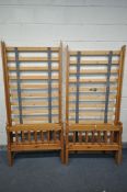 TWO PINE SINGLE BEDSTEADS, with all bolts (condition:-some paint splashes)