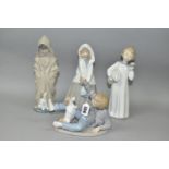 FOUR NAO FIGURES OF CHILDREN, comprising a boy with pillow and alarm clock (glued repair to the