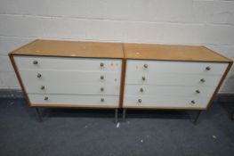 A PAIR OF G PLAN OAK CHEST OF FOUR LONG DRAWERS, on metal legs, width 97cm x depth 47cm x height