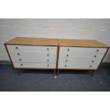 A PAIR OF G PLAN OAK CHEST OF FOUR LONG DRAWERS, on metal legs, width 97cm x depth 47cm x height