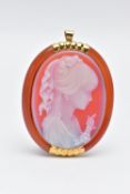 A YELLOW METAL CAMEO BROOCH, of an oval form, carved sardonyx cameo depicting a lady in profile with