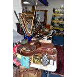 THREE BOXES OF MISCELLANEOUS ITEMS, to include two small brown vintage suitcases, a 1960s guitar,