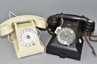TWO ROTARY TELEPHONES, comprising a black GPO Bakelite telephone with pull out drawer front, and