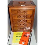 A MAH JONG SET, the set of bamboo tiles contained in a wooden case with five drawers, height 32.