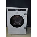 A GRUNDIG GTW27110GW 7KG CONDENSOR DRYER measuring width 60cm x depth 56cm x 84cm height (PAT pass