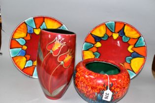 THREE PIECES OF POOLE POTTERY, comprising two Harlequin design shallow circular dishes, diameter