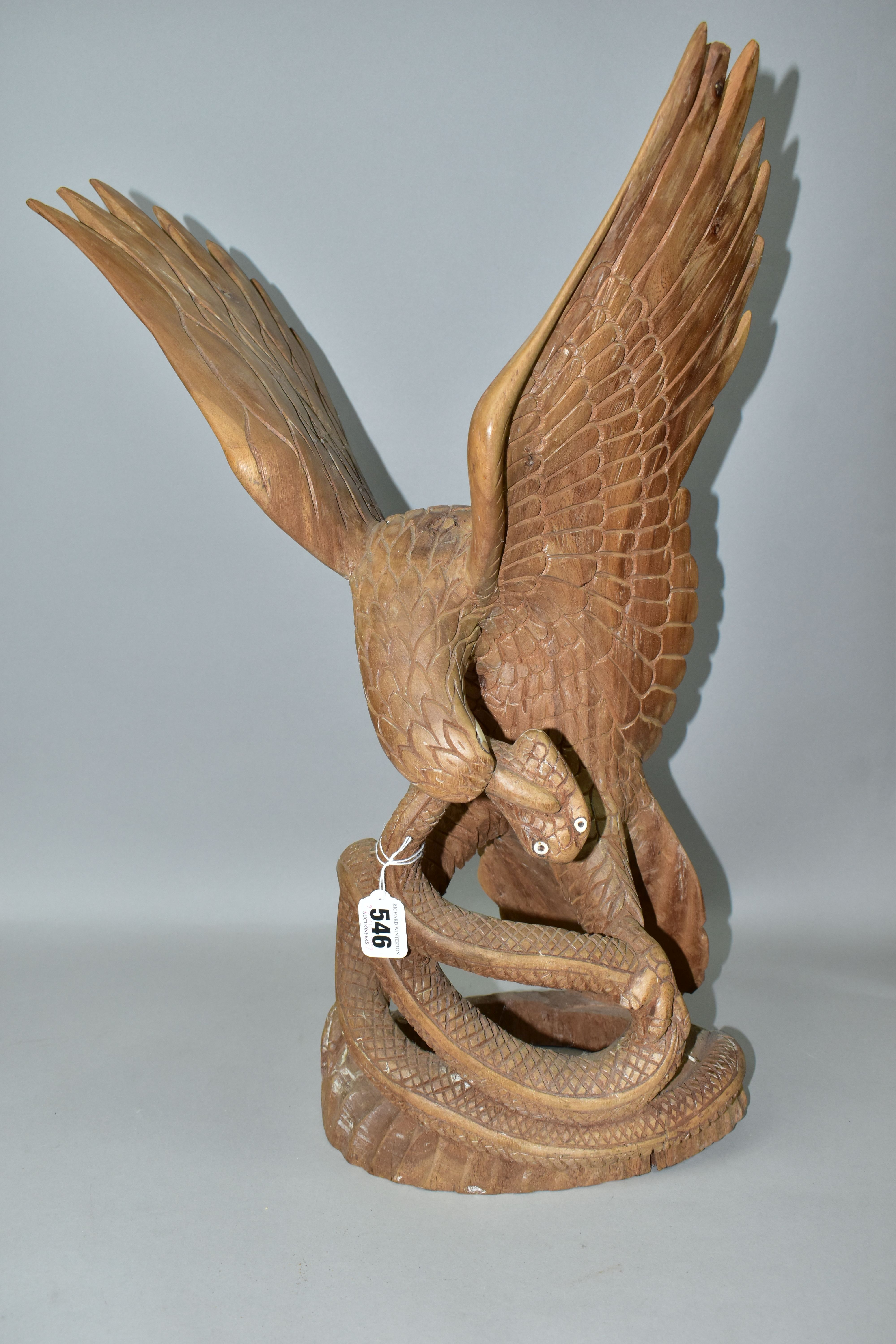 A GROUP OF LAMPS, WOODEN EAGLE AND SNAKE SCULPTURE, AND SUNDRY ITEMS, to include a large carved