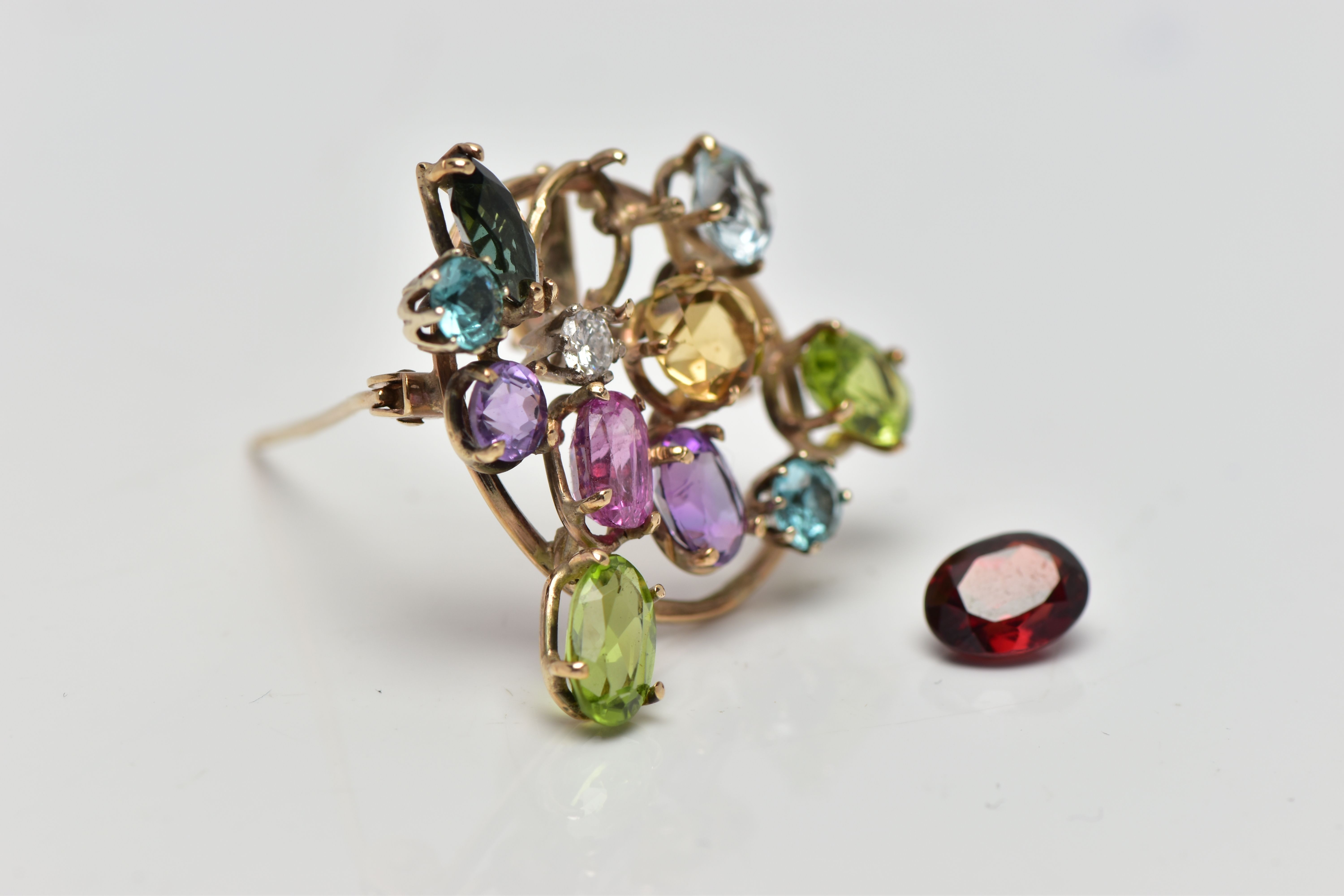 A 9CT GOLD DIAMOND AND COLOURED GEM SET BROOCH, of openwork design the circular cut diamond, - Image 2 of 4