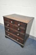 A GEORGIAN MAHOGANY CHEST OF FOUR LONG GRADUATED DRAWERS, with turned handles, on bracket feet,