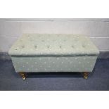 A GREEN UPHOLSTERED BUTTONED POUFFE, width 93cm x depth 53cm x height 46cm (condition:-good