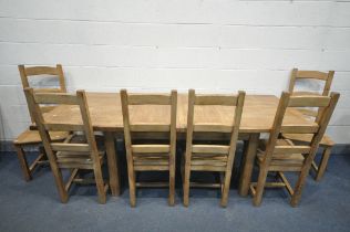 A SOLID OAK EXTENDING DINING TABLE, with two additional leaves, open length 226cm x closed 150cm x