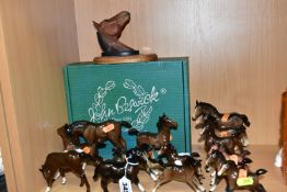 A BESWICK WALL PLAQUE 'TROY', NO.2699, TOGETHER WITH FOURTEEN BESWICK BROWN GLOSS AND MATT FOALS,