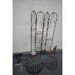 A WROUGHT IRON FOLDING PLANT STAND, open length 95cm x closed 27cm x height 176cm, seven various
