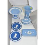 SIX PIECES OF WEDGWOOD PALE AND DARK BLUE JASPERWARE, comprising a small comport, diameter 15.5cm,