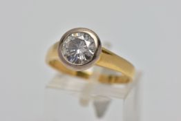 AN 18CT GOLD SINGLE STONE MOISSANITE RING, circular cut moissanite in a white metal collet