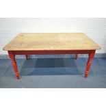 A 19TH CENTURY PINE KITCHEN TABLE, on a red painted base, length 160cm x depth 93cm x height 74cm (