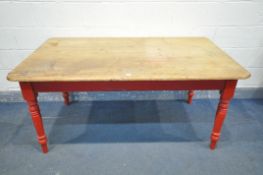 A 19TH CENTURY PINE KITCHEN TABLE, on a red painted base, length 160cm x depth 93cm x height 74cm (