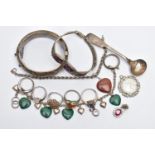 AN ASSORTMENT OF SILVER AND WHITE METAL JEWELLERY, to include a silver wide hinged bangle,