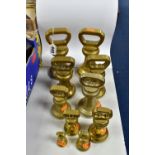 TEN BRASS BELL WEIGHTS, from different sets, comprising 7lb (x2), 4lb (x3), 2lb (x2), 1lb, 8oz and