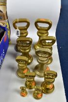 TEN BRASS BELL WEIGHTS, from different sets, comprising 7lb (x2), 4lb (x3), 2lb (x2), 1lb, 8oz and