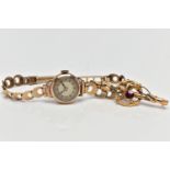A LADIES MID 20TH CENTURY 9CT GOLD WRISTWATCH AND 9CT GOLD TOURMALINE BROOCH AF, the first a