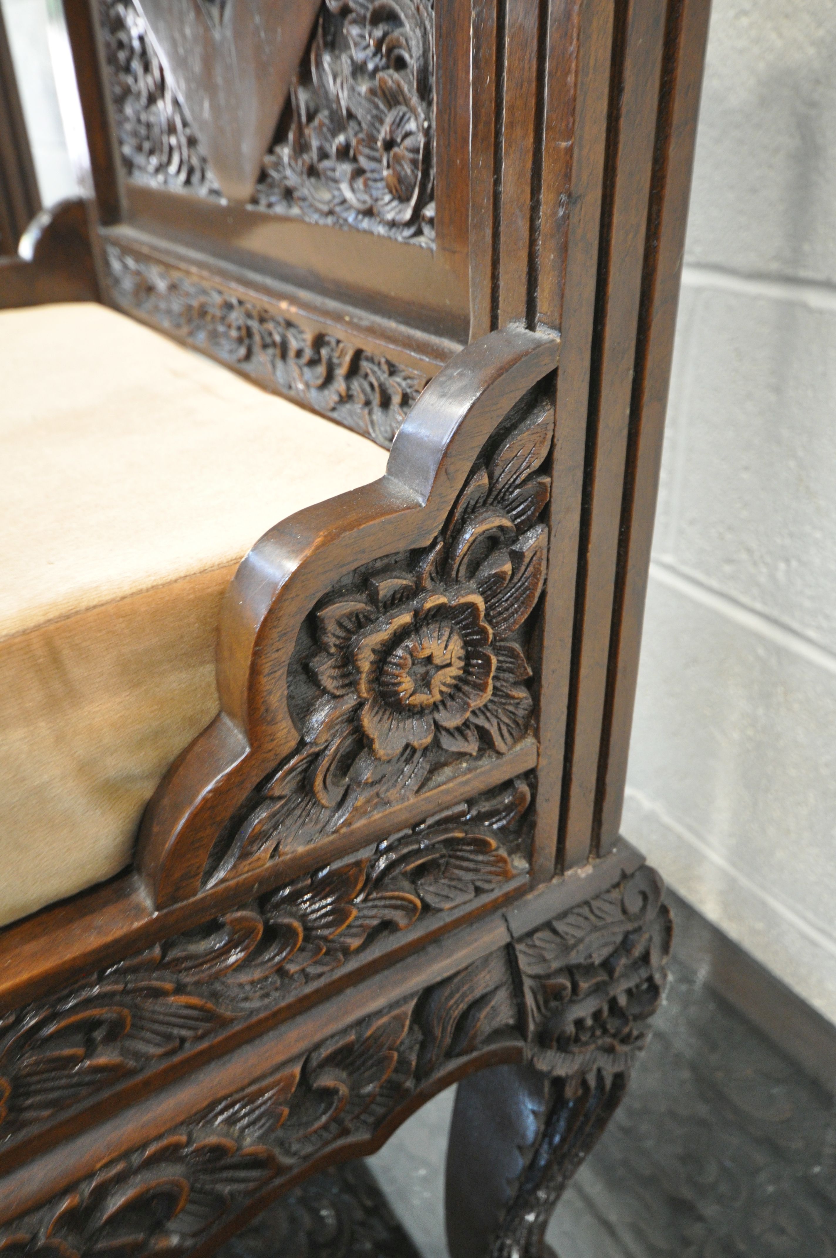 A 20TH CENTURY THAI ORIENTAL HEAVILY CARVED STAINED TEAK DINING TABLE, the recessed top with a - Image 7 of 7