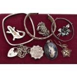 AN ASSORTMENT OF WHITE METAL JEWELLERY, to include a square bangle, a damascene pendant, a heart
