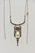 A FRENCH SILVER PENDANT NECKLACE, the art deco style drop pendant suspending a baroque imitation