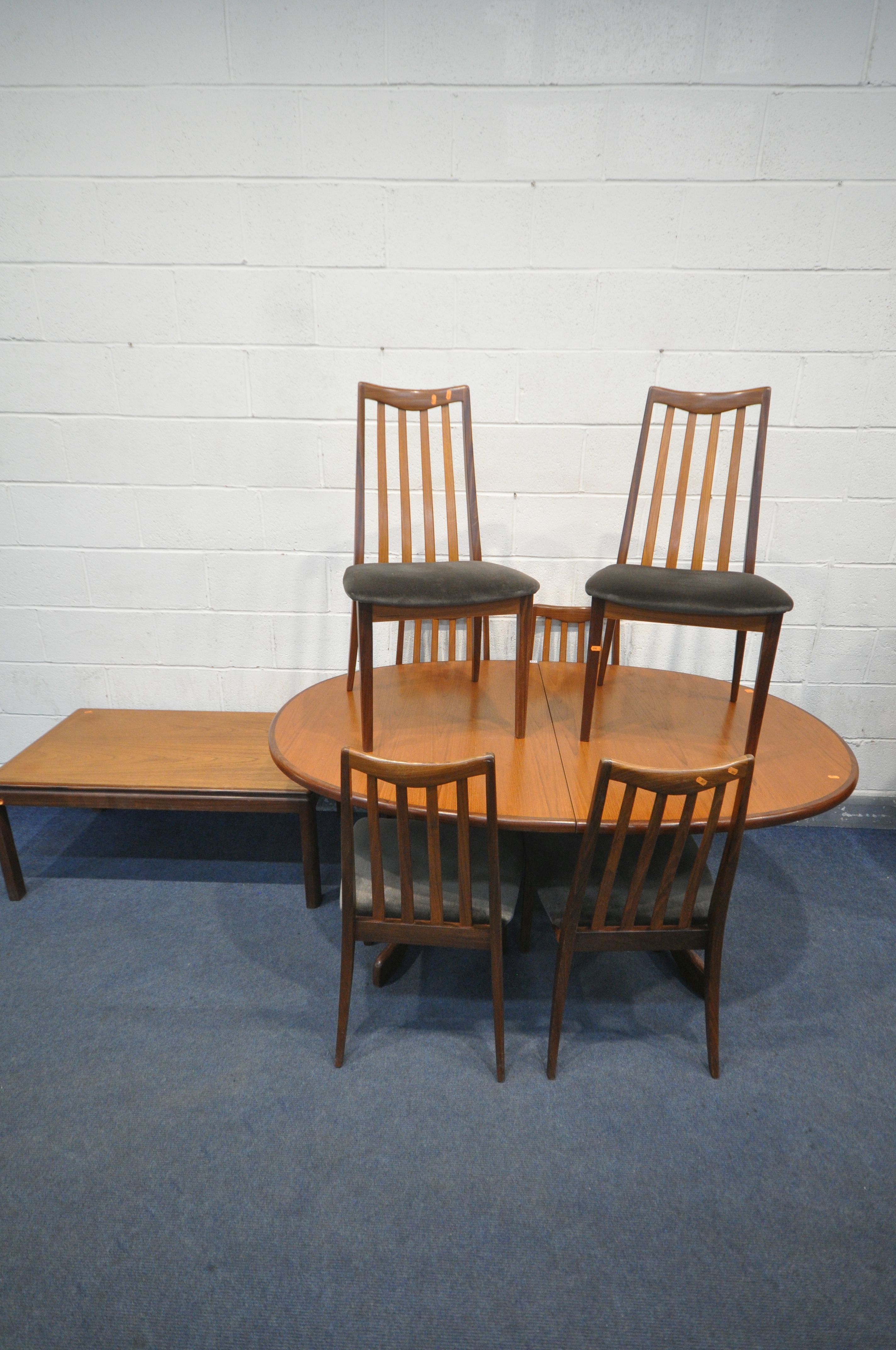 A G-PLAN FRESCO TEAK OVAL EXTENDING DINING TABLE, with a single fold out leaf, open length 211cm x