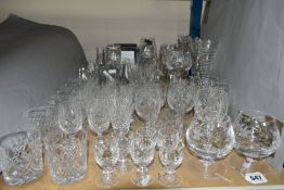 A QUANTITY OF CUT CRYSTAL GLASSWARES, approximately fifty pieces to include a boxed Dartington