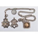 AN EARLY 20TH CENTURY SILVER ALBERT CHAIN WITH THREE SILVER FOBS, the curb link Albert chain with