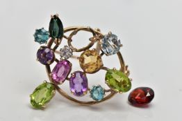 A 9CT GOLD DIAMOND AND COLOURED GEM SET BROOCH, of openwork design the circular cut diamond,