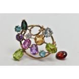 A 9CT GOLD DIAMOND AND COLOURED GEM SET BROOCH, of openwork design the circular cut diamond,