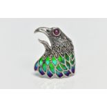 A WHITE METAL PLIQUE A JOUR, RUBY AND MARCASITE BIRD BROOCH, depicting a bird of prey's head and