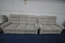A BEIGE UPHOLSTERED ELECTRIC RECLINING SUITE, comprising a three seater settee, length 207cm, and
