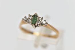 A 9CT GOLD EMERALD AND DIAMOND DRESS RING, the marquise cut emerald, with a trefoil of single cut