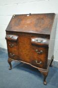 A WARING AND GILLOW LTD OF LONDON BURR WALNUT LADIES BUREAU, with a fitted interior, three