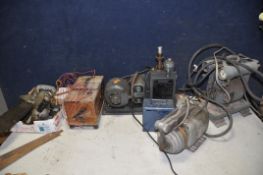 A COLLECTION OF VINTAGE POWERTOOLS to include a vintage universal amp tester, Hoover a.c motor,