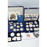 A PLASTIC BOX CONTAINING COINS AND COMMEMORATIVES, to include a Royal Mint special 90th birthday