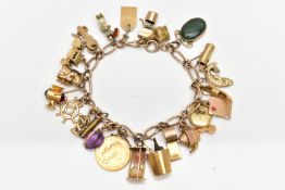 A 9CT GOLD CHARM BRACELET SUSPENDING TWENTY FOUR CHARMS, the fancy link chain with lobster clasp,