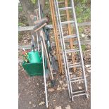 A LONG ALUMINIUM DOUBLE EXTENSION LADDER 4.1m long, a shorter wooden double extension ladder, a