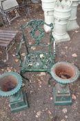 A PAIR OF SMALL 20TH CENTURY CAST IRON CAMPAGNA URNS on square stands with fluted detailing and