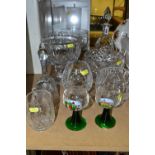 A GROUP OF CUT CRYSTAL comprising of a Royal Doulton decanter, two footed fruit bowls, two smaller