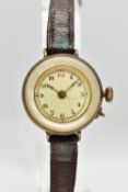 AN EARLY 20TH CENTURY MANUAL WINDING WRISTWATCH, the white enamel dial, with hourly applied Roman